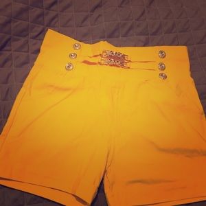 Bright yellow high waisted shorts